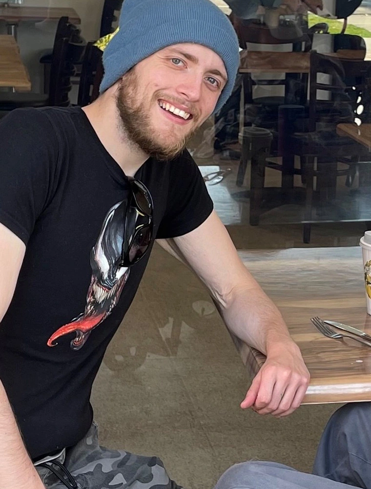 Bailey is a customer at the Brew Crew Cafe at NDIS registered disability support Distinctive Options